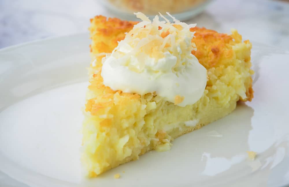 Classic Coconut Impossible Pie, made with homemade baking mix on a white plate
